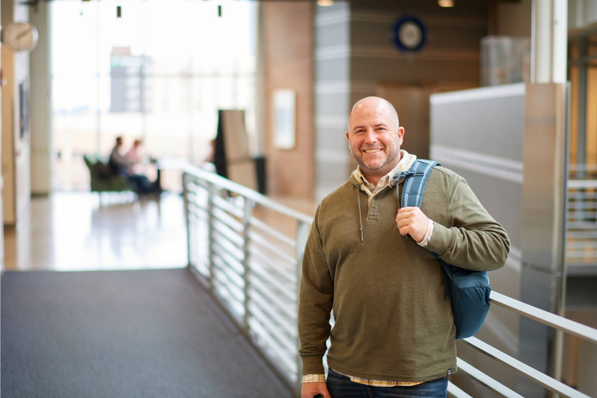Adult student with a backpack.